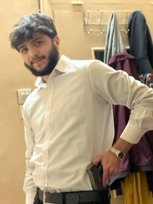 Young men pose with handguns in Damascus area