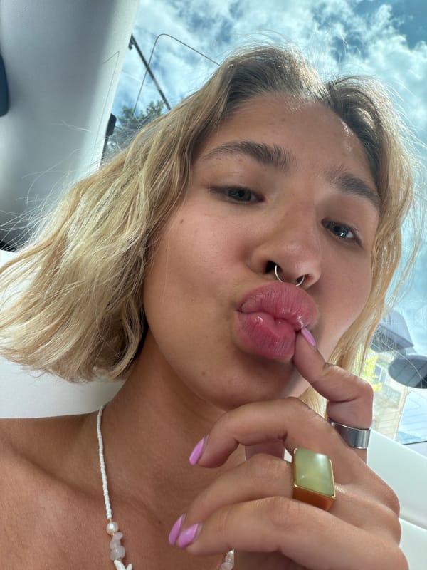 Candid tilted selfie with septum piercing in Tbilisi