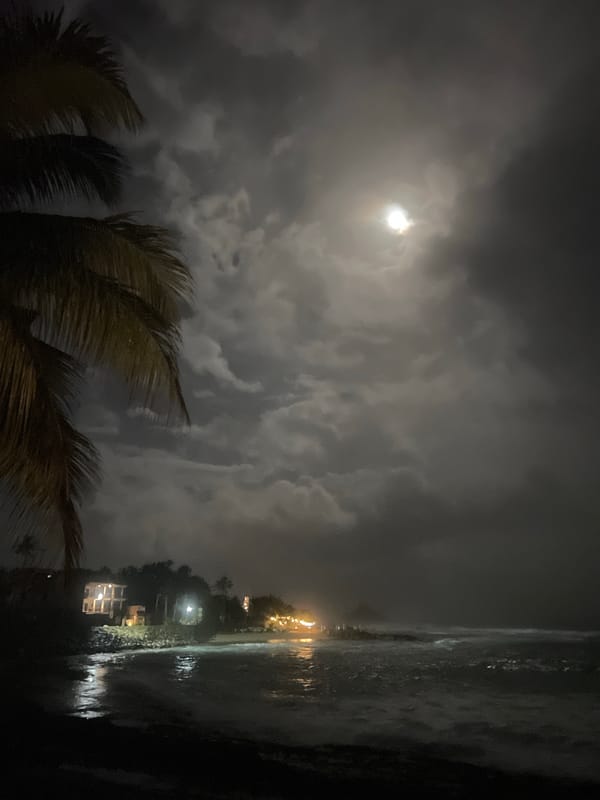 Full moon illuminates cloudy coastal night in Goviyapana, Sri Lanka