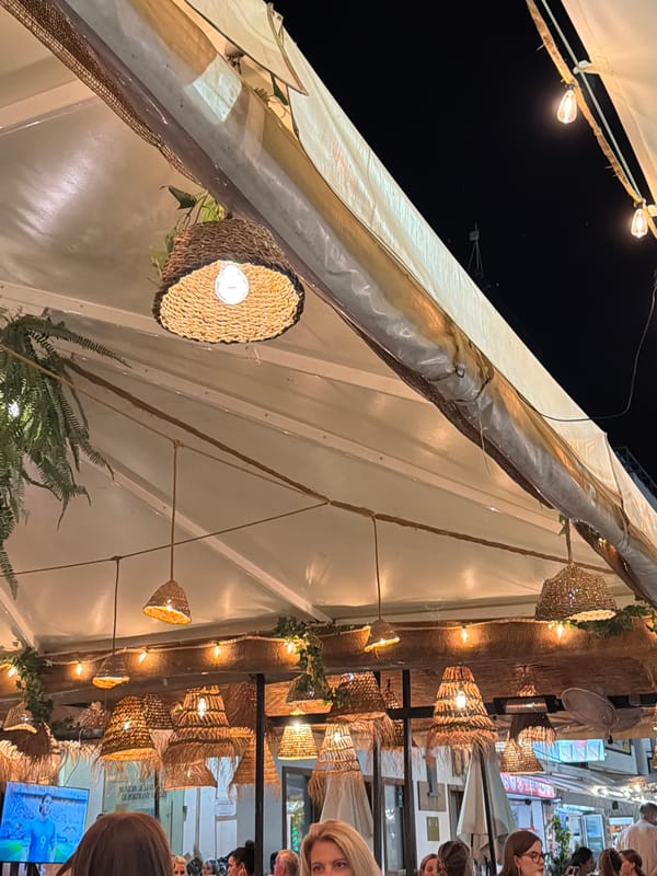 Dinner and drinks at a Sant Antoni waterfront restaurant, Ibiza night