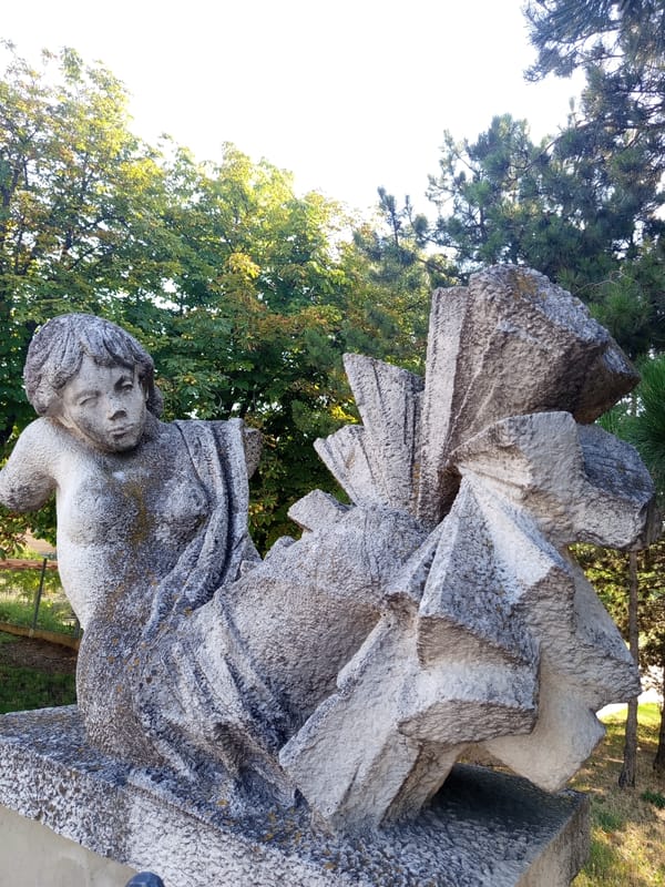 Stone sculpture and a quick selfie, Brno, July morning