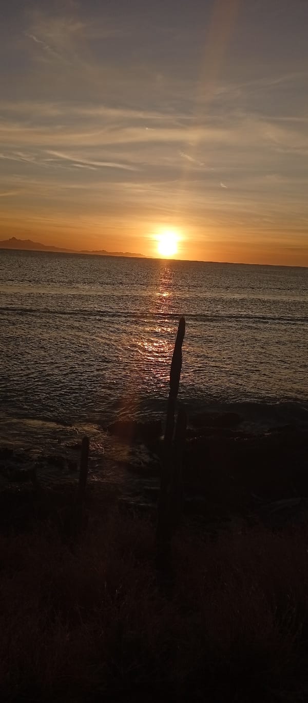 Evening sunset documentation captures Juan Griego coastal scenes, selfies