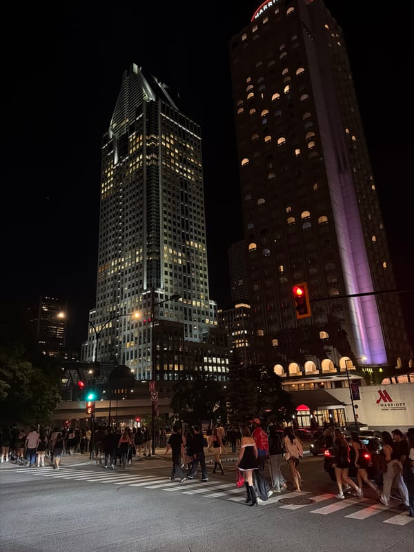 Nighttime street scene captured at Montreal downtown intersection