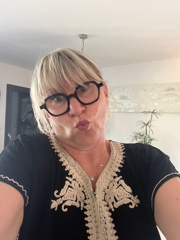 Woman takes indoor selfie in Chambœuf, France