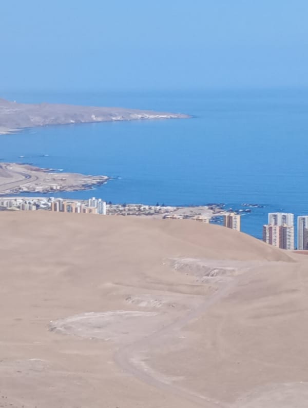 Aerial views capture Iquique's urban-desert contrast from high vantage