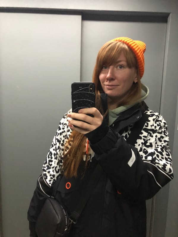 Woman Takes Mirror Selfie in Krasnoyarsk