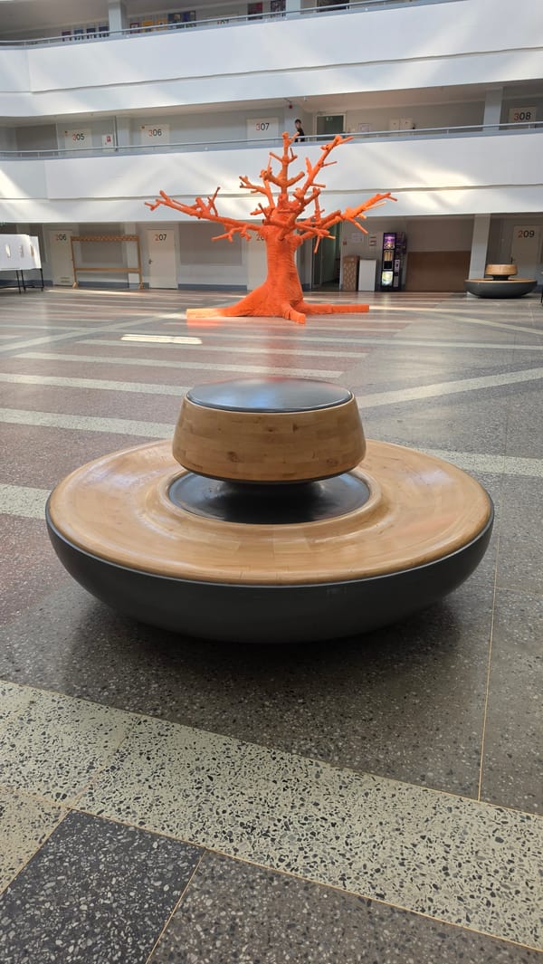 Bold sculptures and butterfly installations inside a Riga atrium