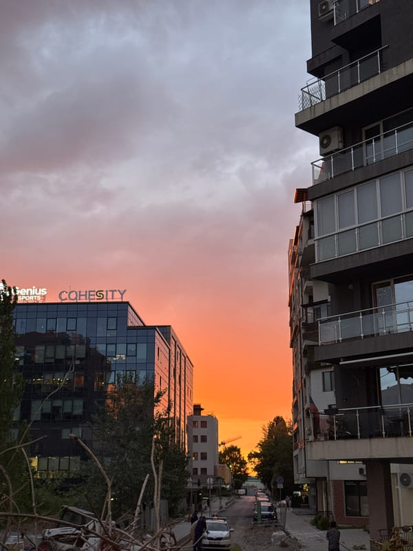 Orange sunset sky frames Sofia street scene