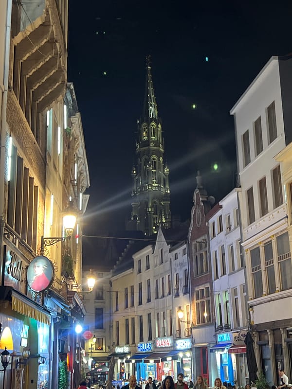 Nighttime views of illuminated Grand Place in Brussels