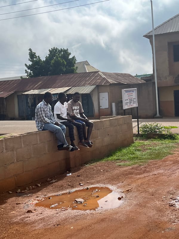 A quiet morning in Barakin Akawo — outdoors, a garden, a gym