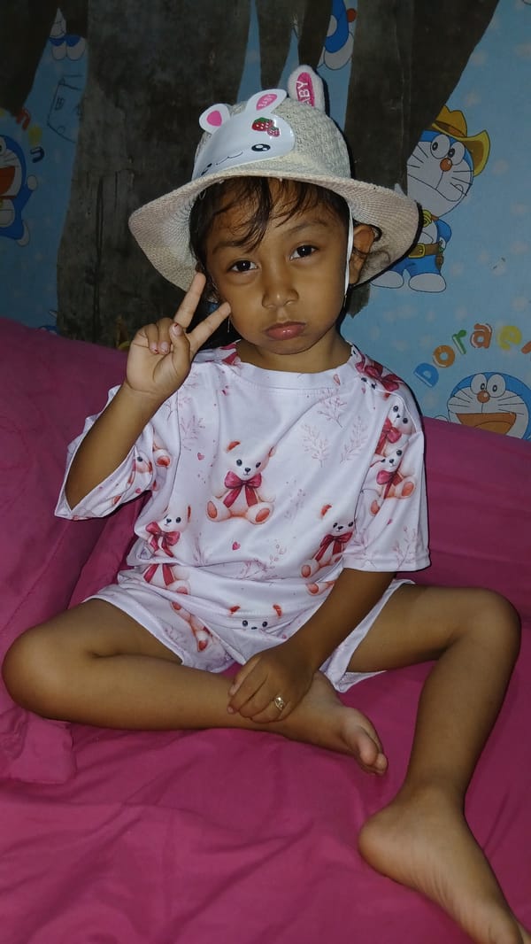 Afternoon at home: teddy bear pajamas, Doraemon walls, and coffee