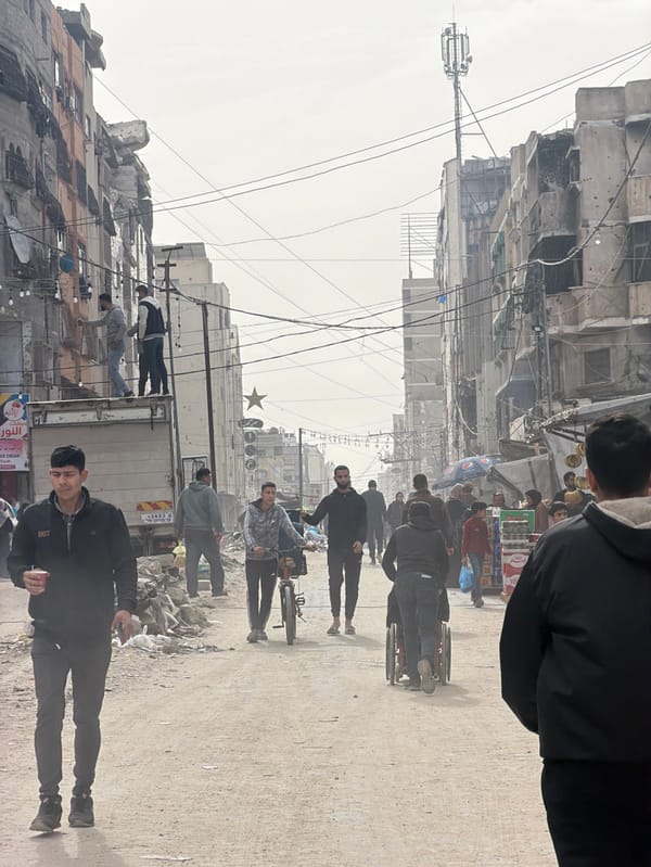 Daily life continues amid damaged Gaza City streets