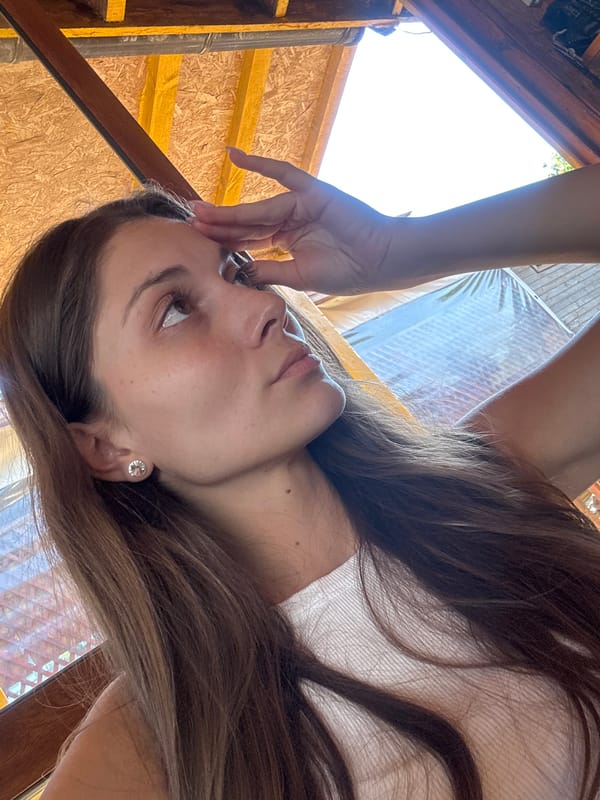 Casual photo moment under a thatched structure in Sozopol