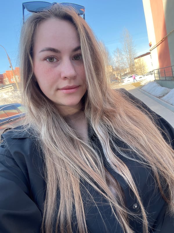 Woman takes selfies with cat in Chaikovsky, Russia