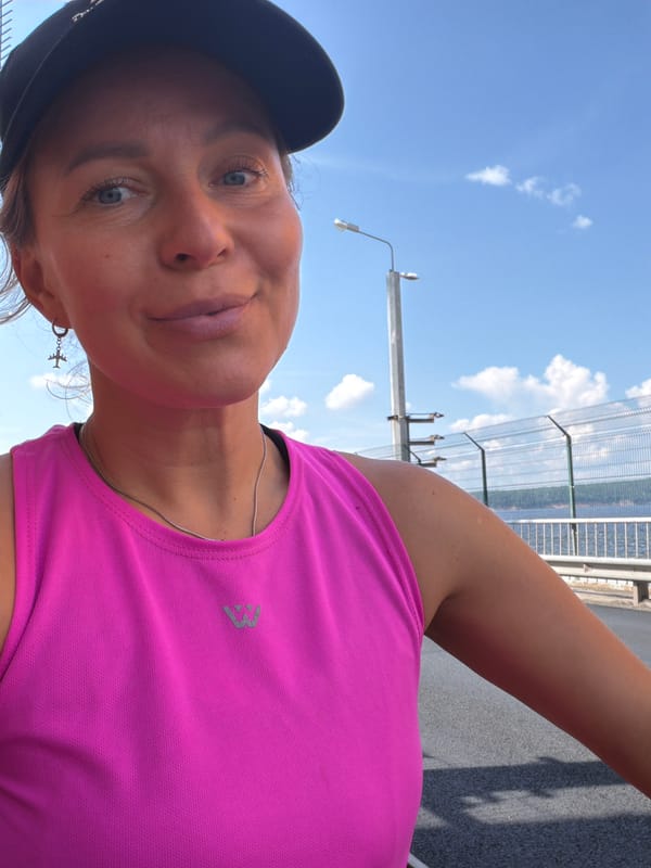 Cycling across industrial bridge in Chaikovsky, Russia