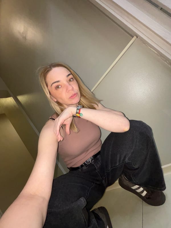 Woman photographed in multiple outfits indoors near Lednevo, Russia