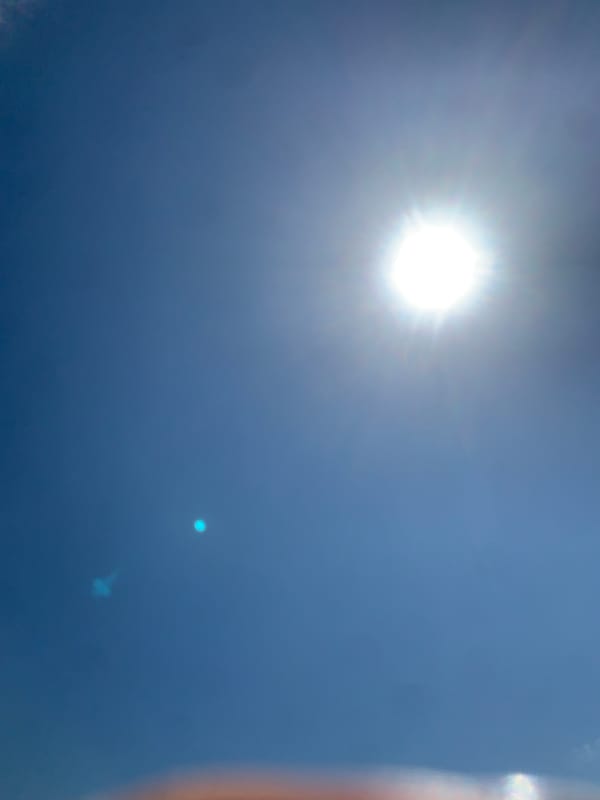 Direct sun shots over Khazar Raion on a clear July morning