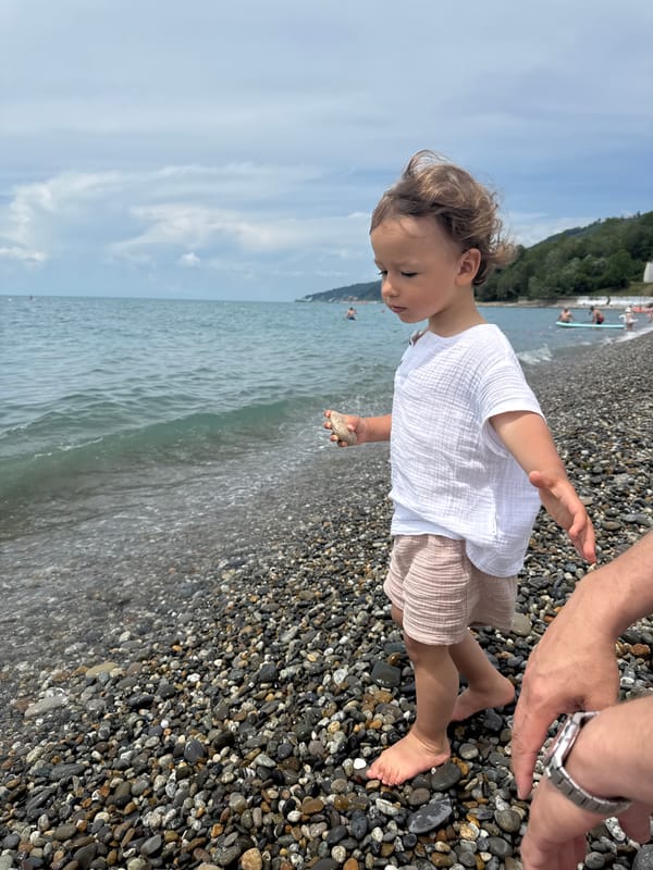 Family beach time and stone collecting in Sochi