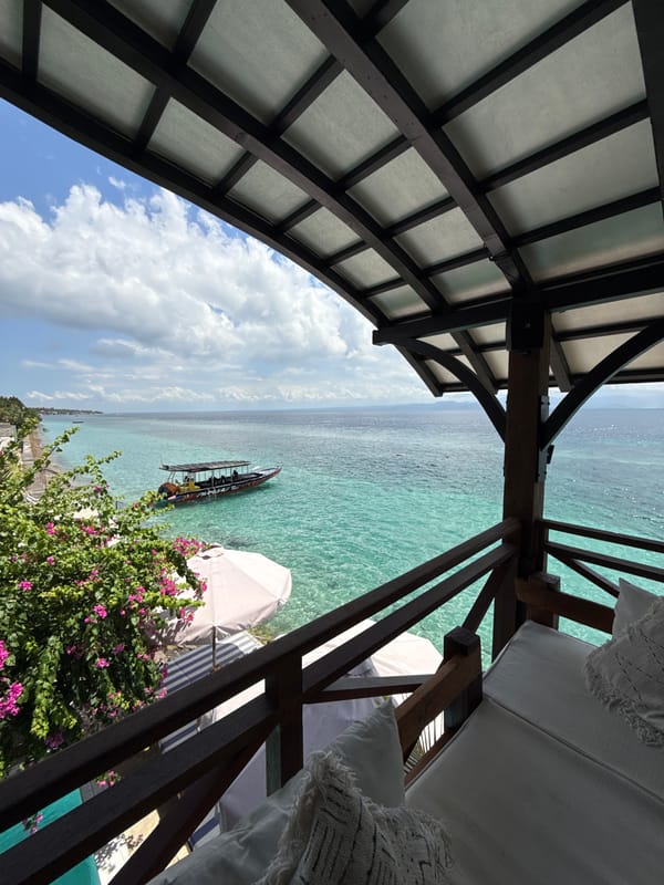 Visitors enjoy early morning waterfront dining in Nusa Penida