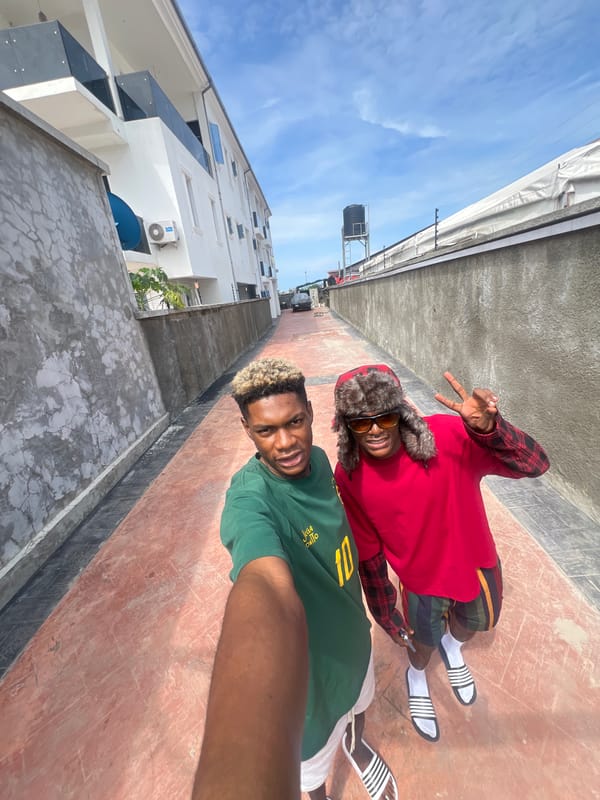 Young men photographed, passengers travel by vehicle in Igboefon