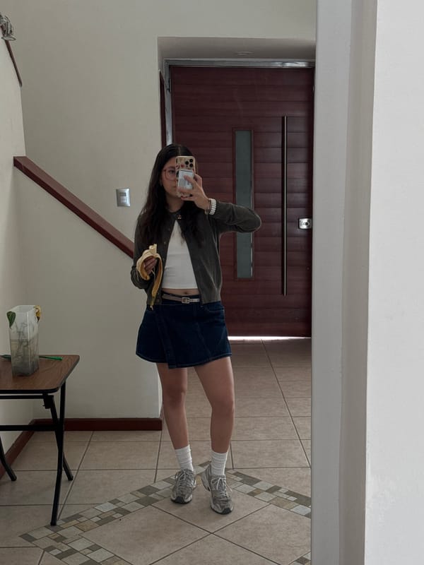 Woman takes mirror selfies indoors in Puebla, Mexico