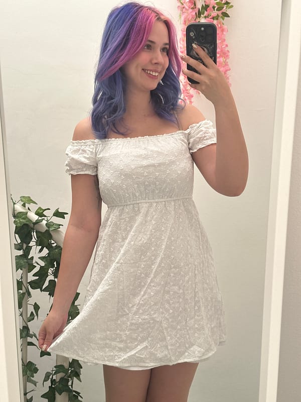 Colorful-haired woman documents selfie session in Zagreb apartment