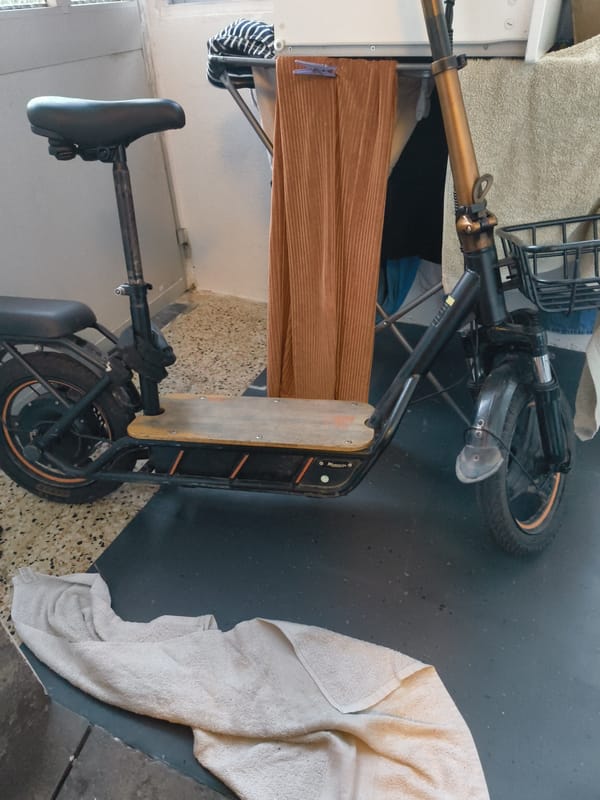 Balcony scooter and a Rolex box full of coins, Oeiras