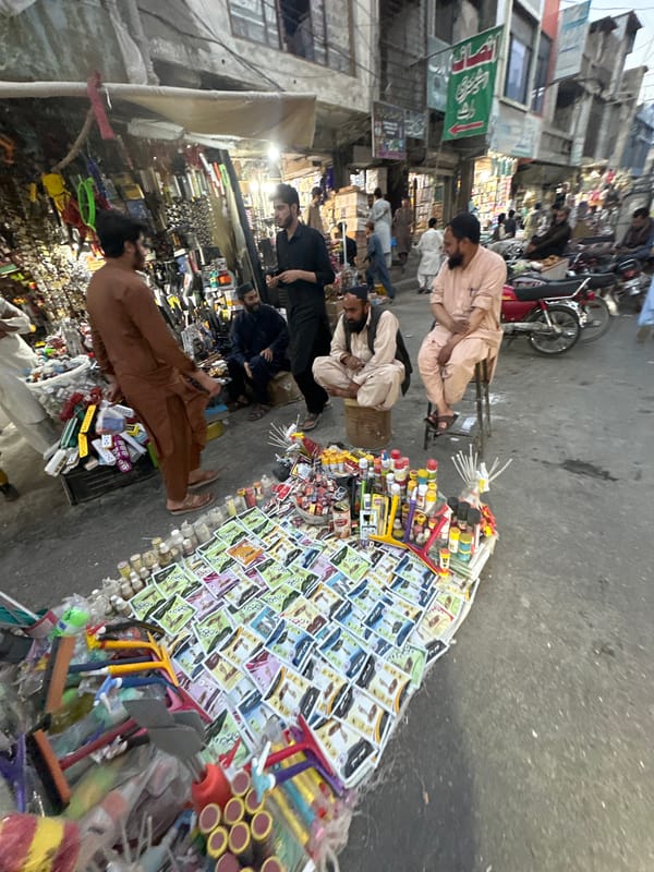 Street vendors operate market stalls in Quetta City