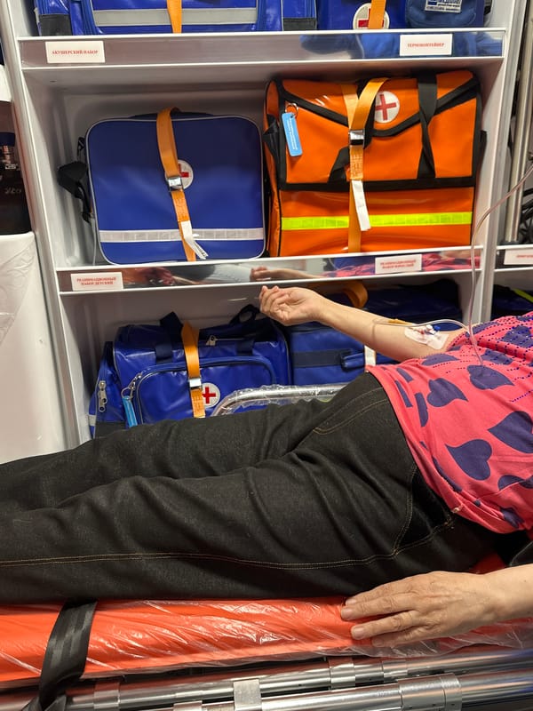 Patient receives IV treatment in Moscow ambulance