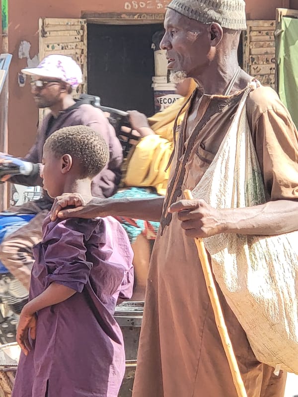 Daily life unfolds in Nigerian market district