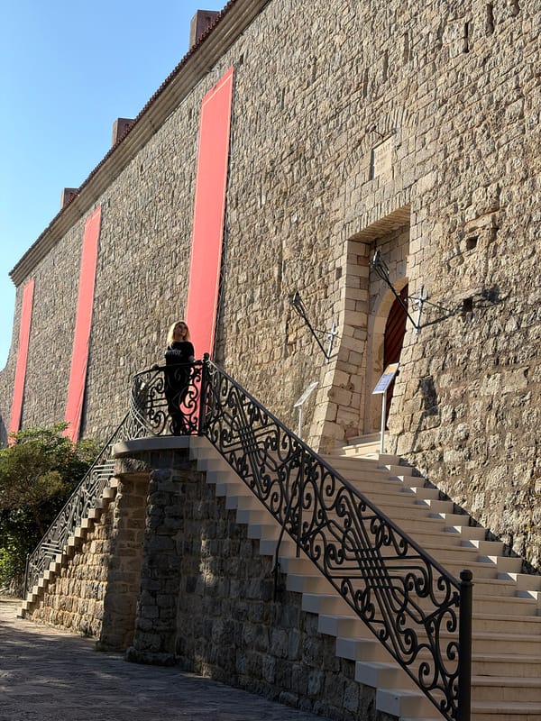 Tourist documents morning visit to historic Budva, Montenegro locations