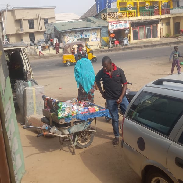 Morning street life documented in Nigerian commercial districts
