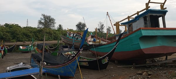 Fishing boats grounded at boatyard in Lhokseumawe, Indonesia