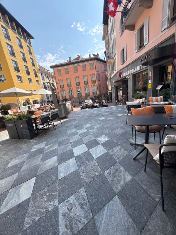 Strolling through Lugano's sunny pedestrian center on a summer morning