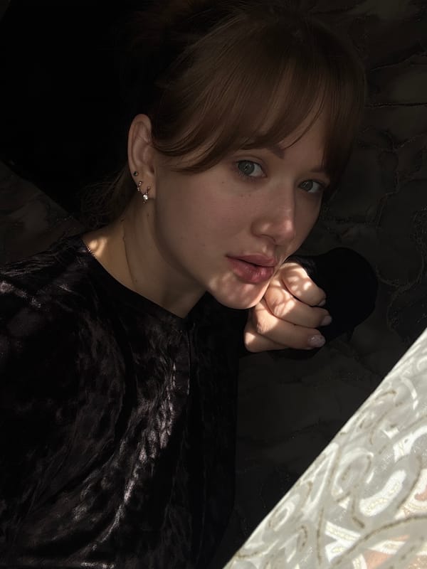 Back-to-back indoor selfies from Chaikovsky, Russia
