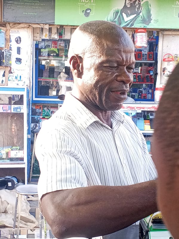 Street-level scenes at a Jos, Nigeria market stall