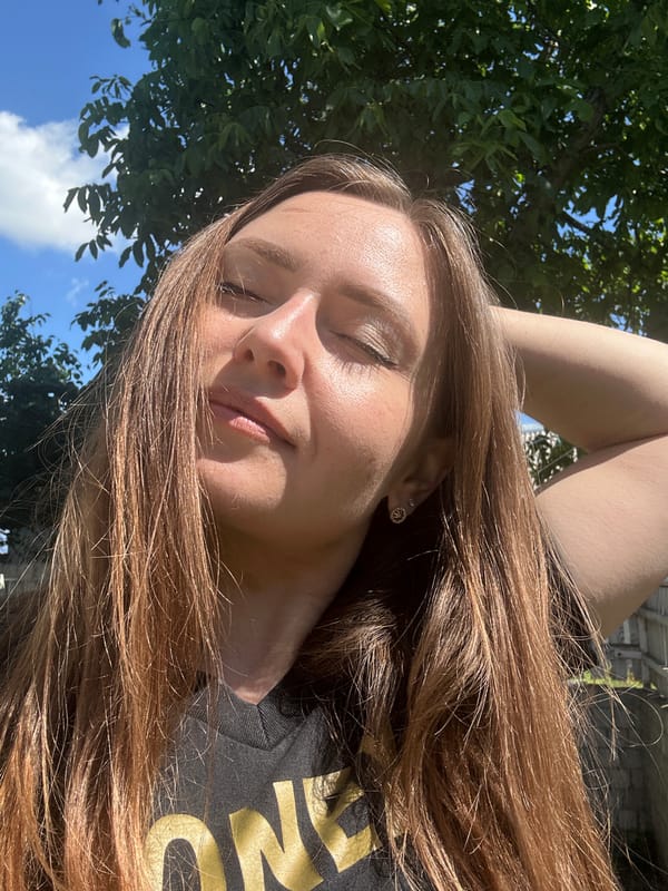 Sunny bike stop and selfies among petunias in Bila Tserkva