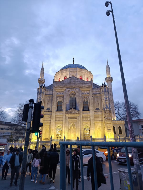 Ortaköy Mosque illuminated at dusk in Istanbul