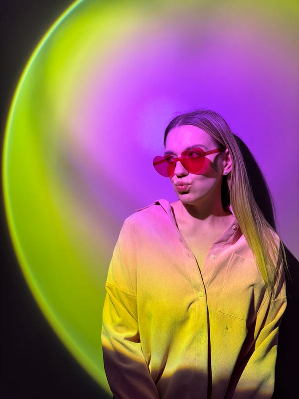 Woman rests on heart-patterned surface in Dreiliņi, Latvia