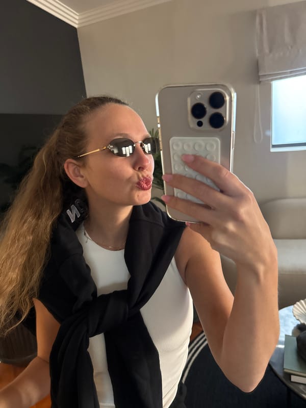 Woman takes mirror selfies in Cape Town residence