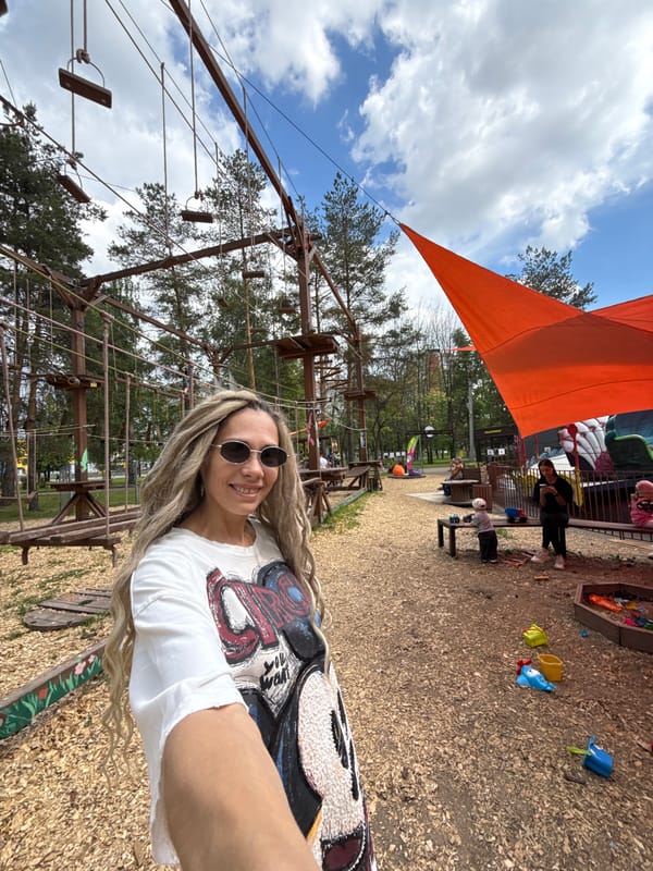 Woman enjoys sunny day at Russian adventure park