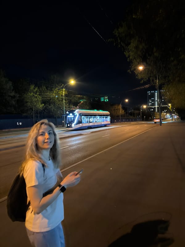 Nighttime scenes captured across Moscow show people, architecture