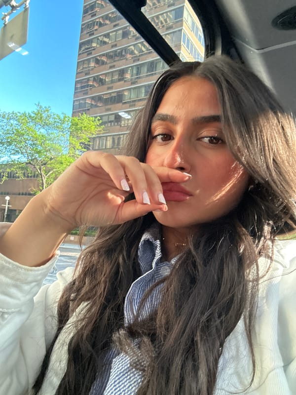 Woman observed in car near tall building in NYC