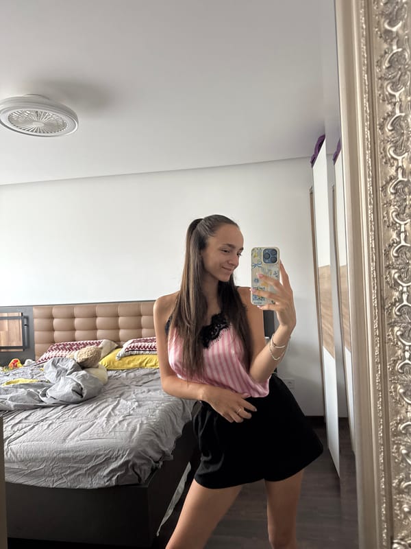 Bedroom mirror selfie in casual loungewear, Sofia