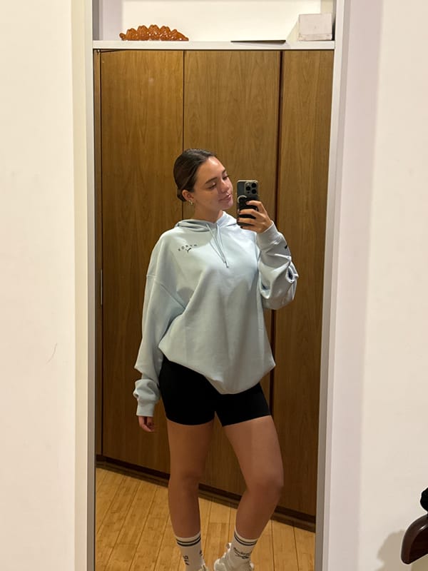Woman takes late-night mirror selfie in Mexican home