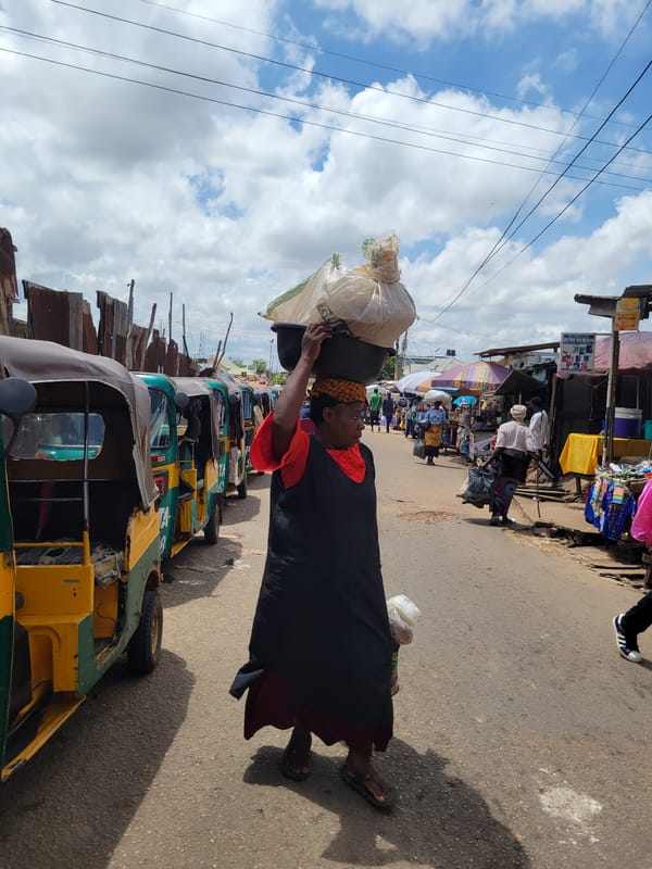 Street life and market activity across Jos on a cloudy morning