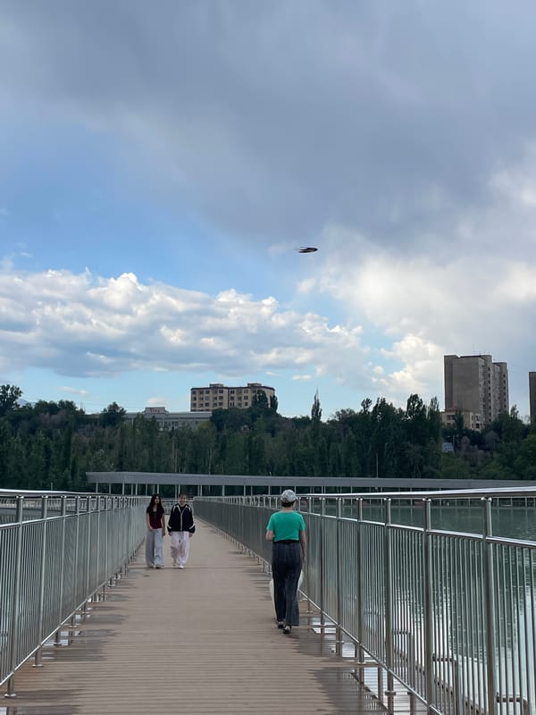Almaty park lake draws a relaxed crowd on a July morning