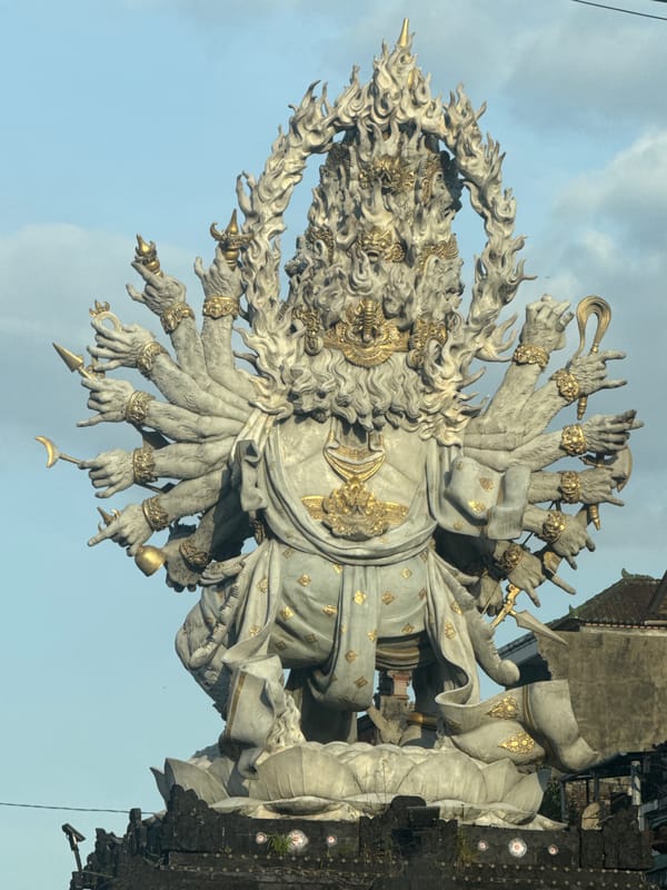 Multi-armed stone deity statue observed in Kediri, Indonesia