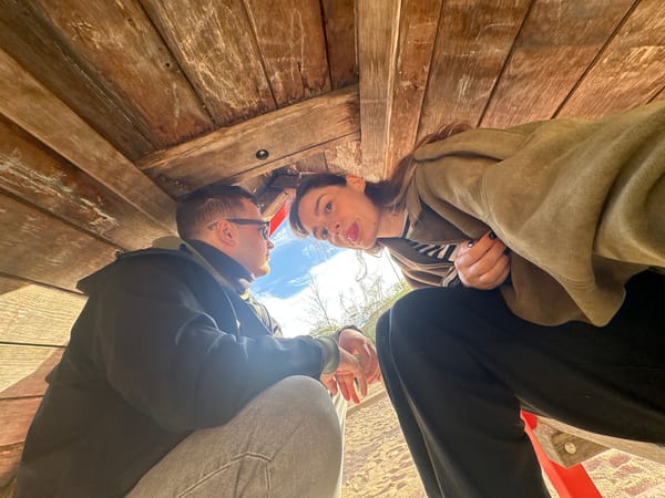 Couple photographed at wooden structure in Kiel, Germany