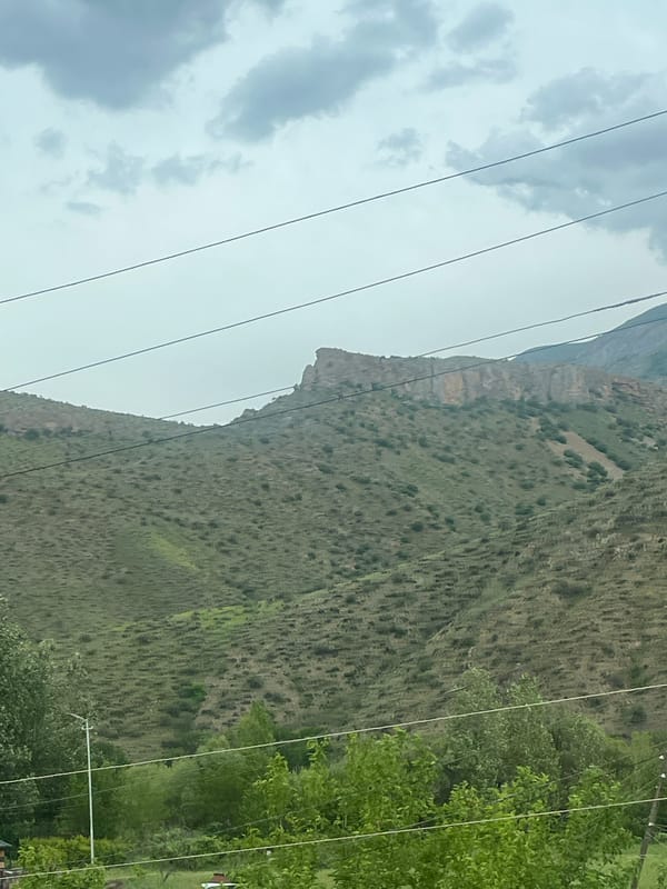 Vehicle journey documents mountainous landscapes in Chiva, Armenia